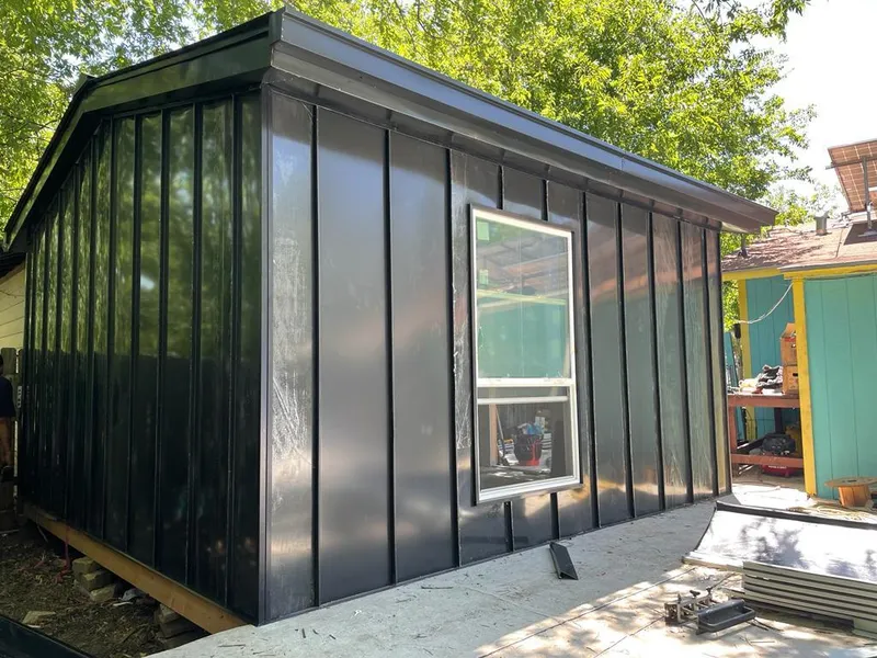 Black standing seam metal wall panels for Roof Inspection in Twin Lakes